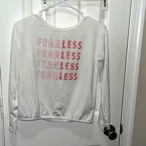 brand: xersion. size: L 14 color: white, pink, words: fearless